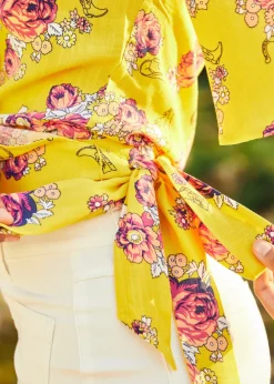 Amos Eastern Apparel Inc. Best Is Yet to Come Wrap Top Yellow Floral Clearance