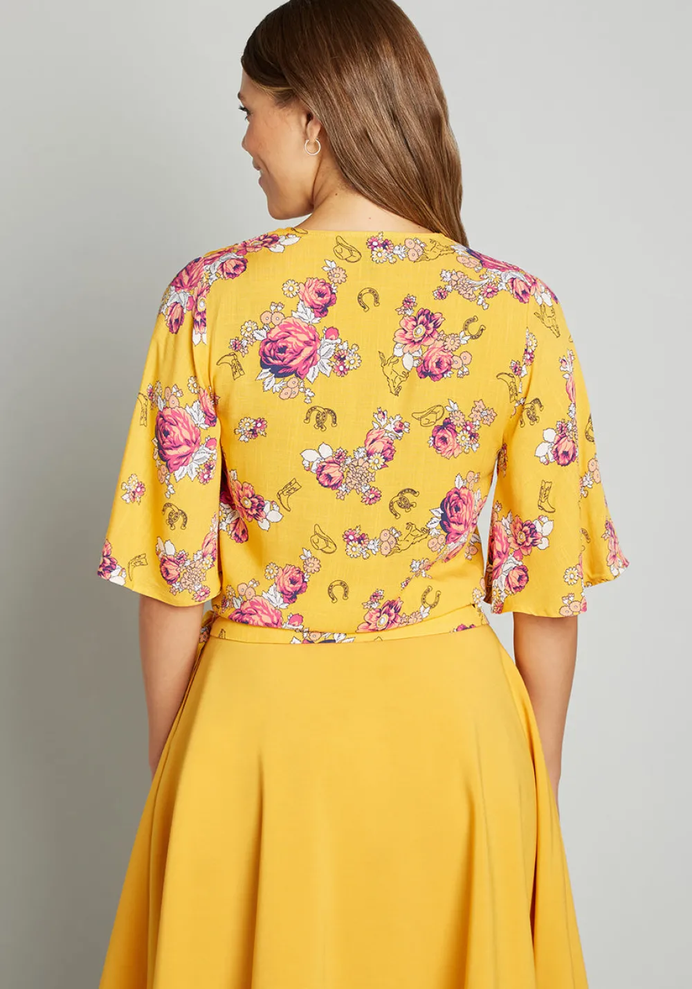 Amos Eastern Apparel Inc. Best Is Yet to Come Wrap Top Yellow Floral Clearance